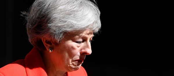 British Prime Minister Theresa May reacts as she delivers a statement in London, Britain, May 24, 2019 British Prime Minister Theresa May reacts as she delivers a statement in London, Britain, May 24, 2019 - Sputnik Afrique