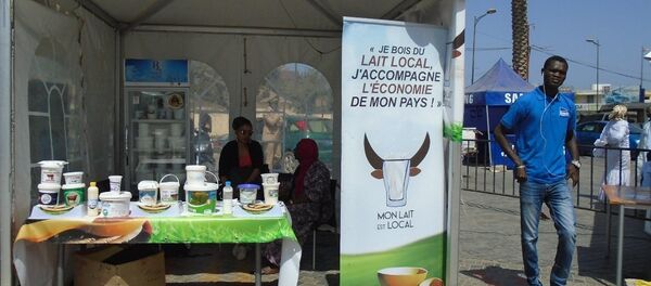 Un stand d’exposition-vente à Dakar, lors de la célébration de la Journée mondiale du lait, le 1er juin 2019. - Sputnik Afrique