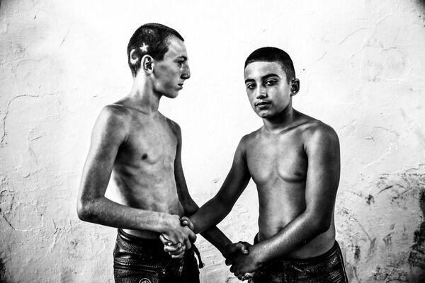 Festival de lutte turque du photographe turc Elif Ozturk Ozgoncu, finaliste dans la catégorie Sport, série de photos. - Sputnik Afrique