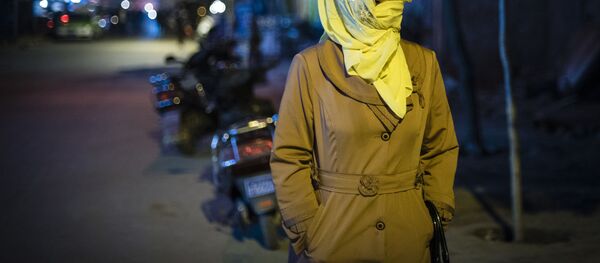 Femme ouïgoure en Chine - Sputnik Afrique