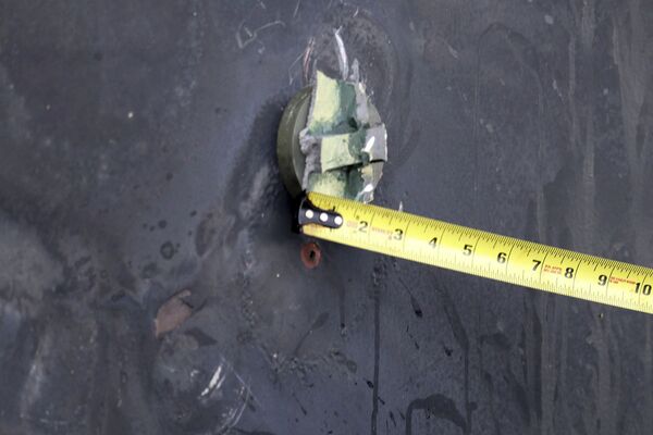 Voici les nouvelles images publiées par le Pentagone devant accuser l’Iran de l’attaque en mer d’Oman Voici les nouvelles images publiées par le Pentagone devant accuser l’Iran de l’attaque en mer d’Oman - Sputnik Afrique