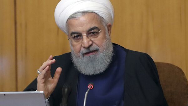Sur cette photo publiée par le site officiel du bureau de la présidence iranienne, le président Hassan Rouhani s'exprime lors d'une réunion de cabinet à Téhéran, en Iran, le mercredi 8 mai 2019 - Sputnik Afrique