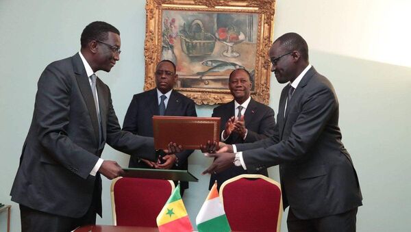 Les présidents Macky Sall et Alassane Ouattara signent des accords bilatéraux  - Sputnik Afrique