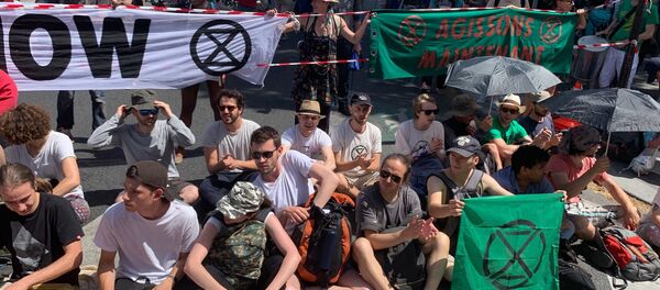 des militants du groupe Extinction Rebellion - Sputnik Afrique