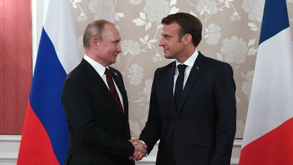 Vladimir Poutine et Emmanuel Macron  - Sputnik Afrique