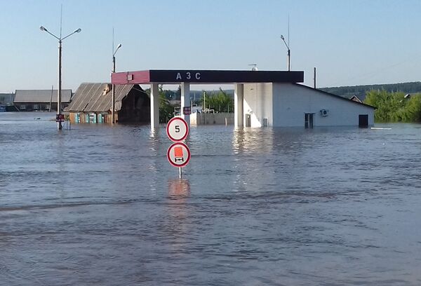 Au moins 12 morts et 751 blessés dans les inondations en Sibérie - images Au moins 12 morts et 751 blessés dans les inondations en Sibérie - images - Sputnik Afrique