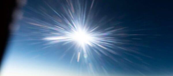 L'éclipse solaire vue depuis un avion d'Aerolineas Argentinas L'éclipse solaire vue depuis un avion d'Aerolineas Argentinas - Sputnik Afrique