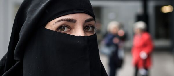 une femme portant le niqab - Sputnik Afrique