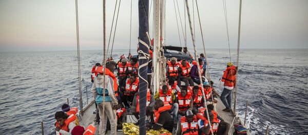 Des migrants - Sputnik Afrique