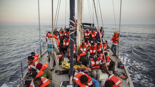 Des migrants - Sputnik Afrique