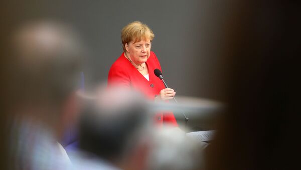 Bundeskanzlerin Angela Merkel beim Auftritt im deutschen Bundestag - Sputnik Afrique