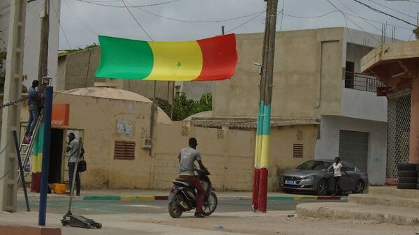 Une rue de Dakar, le vendredi 19 juillet 2019, avant le coup d’envoi du match Sénégal-Algérie, finale de la Coupe d’Afrique des Nations (CAN) 2019. - Sputnik Afrique