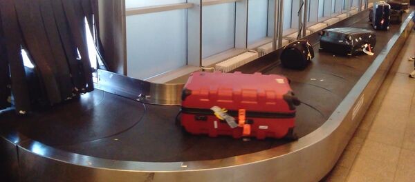 Un tapis roulant à bagages - Sputnik Afrique