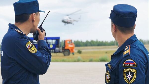 Сотрудники МЧС РФ прибыли для ликвидации лесных пожаров в Якутии - Sputnik Afrique