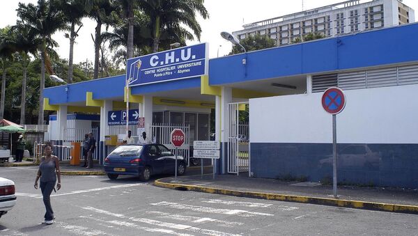 A picture taken on August 27, 2012 shows the entrance of the Pointe-a-Pitre CHU (University Hospital) in the French Caribbean overseas department of Guadeloupe, where French rock star Johnny Hallyday was hospitalized before being transferred for a cardiological assessment to Fort-de-France CHU in the caribbean island of La Martinique. - Sputnik Afrique