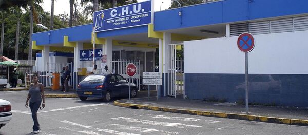 A picture taken on August 27, 2012 shows the entrance of the Pointe-a-Pitre CHU (University Hospital) in the French Caribbean overseas department of Guadeloupe, where French rock star Johnny Hallyday was hospitalized before being transferred for a cardiological assessment to Fort-de-France CHU in the caribbean island of La Martinique. - Sputnik Afrique