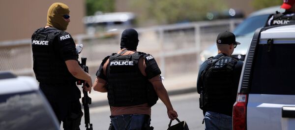 Police arrive after a mass shooting at a Walmart in El Paso, Texas, U.S. August 3, 2019. REUTERS/Jorge Salgado - Sputnik Afrique