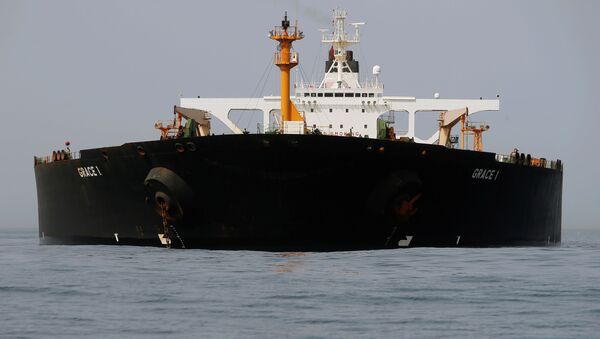 Iranian oil tanker Grace 1 sits anchored after it was seized earlier this month by British Royal Marines off the coast of the British Mediterranean territory on suspicion of violating sanctions against Syria, in the Strait of Gibraltar, southern Spain July 20, 2019 le pétrolier iranien Grace 1 - Sputnik Afrique