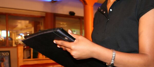 Une hôtesse d’accueil - Sputnik Afrique