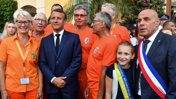 Emmanuel Macron assiste à la commémoration des 75 ans de la libération de Bormes-les-Mimosas, dans le Var, le 17 août 2019 - Sputnik Afrique