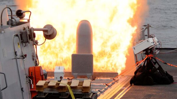 Un tir de missile Tomahawk par un système Mk-41 installé à bord du destroyer USS Sterett (archive photo) - Sputnik Afrique