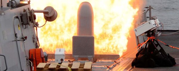 Un tir de missile Tomahawk par un système Mk-41 installé à bord du destroyer USS Sterett (archive photo) - Sputnik Afrique
