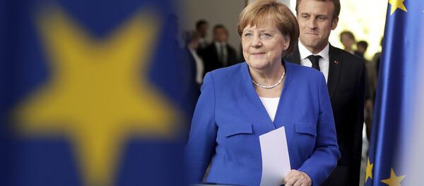 Angela Merkel et Emmanuel Macron - Sputnik Afrique