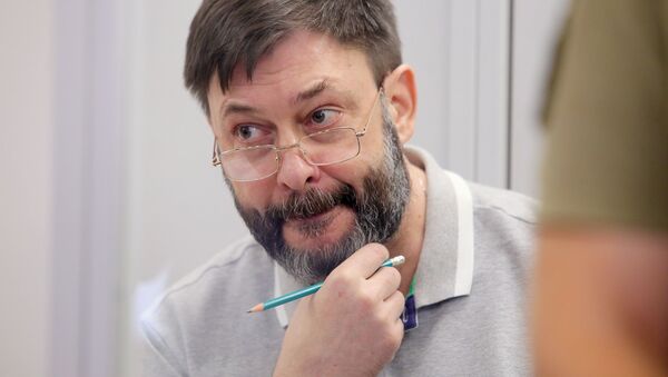 Le rédacteur en chef du portail RIA Novosti Ukraine, Kirill Vychinski, lors d'une séance de la cour d'appel de Kiev (28 août 2019) - Sputnik Afrique