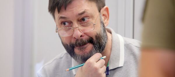 Le rédacteur en chef du portail RIA Novosti Ukraine, Kirill Vychinski, lors d'une séance de la cour d'appel de Kiev (28 août 2019) - Sputnik Afrique