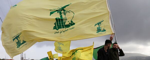 Des partisans du mouvement chiite libanais Hezbollah Des partisans du mouvement chiite libanais Hezbollah - Sputnik Afrique