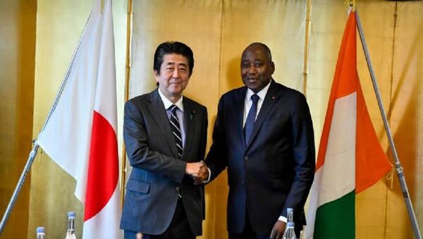 Le Premier ministre de Côte d’Ivoire Amadou Gon Coulibaly et le Premier ministre japonais Shinzo Abe à Tokyo, le 31 août 2019. - Sputnik Afrique