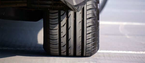 Une roue de voiture, image d'illustration Une roue de voiture, image d'illustration - Sputnik Afrique