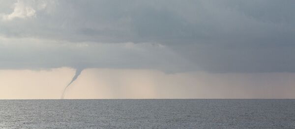 Une trombe marine (image d'illustration) Une trombe marine (image d'illustration) - Sputnik Afrique