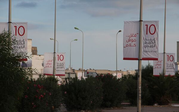 Des affiches électorales dans le grand Tunis: Abdelkrim Zbidi - Sputnik Afrique