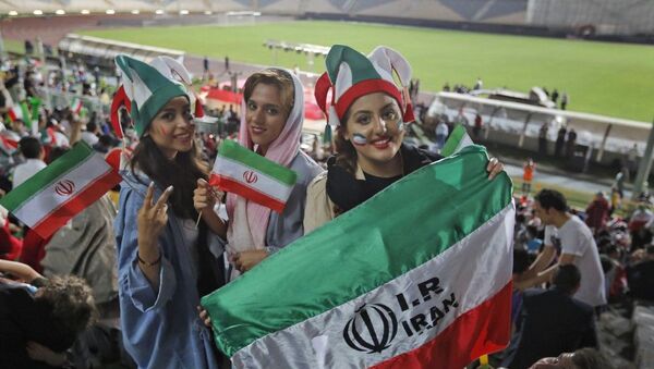 In this file photo taken on June 25, 2018 Iranian women watch the World Cup Group B soccer match between Portugal and Iran at Azadi stadium in Tehran. Iran's judiciary has been asked to investigate the death of a woman football fan, state media said on September 10, 2019, after she reportedly self-immolated because she feared imprisonment for trying to enter a stadium. The country's vice president for women and family affairs, Masoumeh Ebtekar, asked the judiciary chief to look into the case in a letter, the state-run Iran newspaper reported ATTA KENARE / AFP - Sputnik Afrique