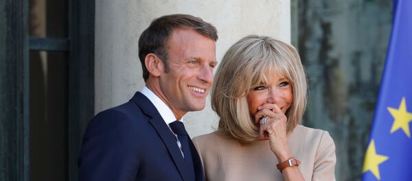 Emmanuel et Brigitte Macron - Sputnik Afrique