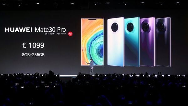 Richard Yu, CEO of Huawei's consumer business group, launches the Mate 30 smartphone range at the Convention Center in Munich, Germany September 19, 2019. - Sputnik Afrique