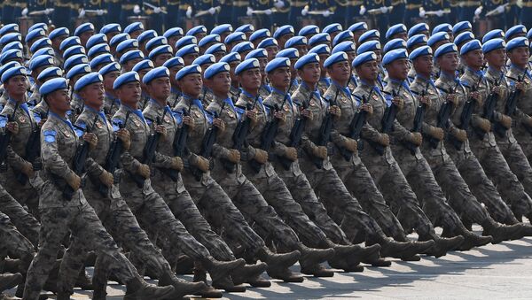 Chinese People's Liberation Army personnel participate in a military parade at Tiananmen Square in Beijing on October 1, 2019 - Sputnik Afrique