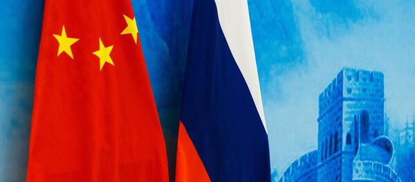 Drapeaux russe et chinois - Sputnik Afrique