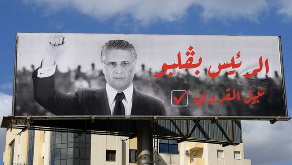 Affiche du candidat à la présidentielle tunisienne Nabil Karoui - Sputnik Afrique