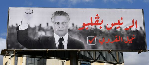 Affiche du candidat à la présidentielle tunisienne Nabil Karoui - Sputnik Afrique