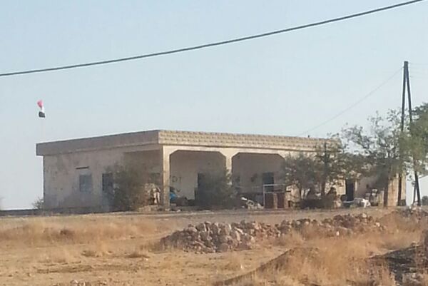 Le drapeau syrien hissé à Kobané, une première depuis 7 ans - photo - Sputnik Afrique