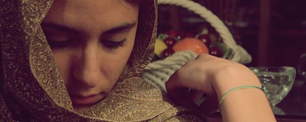 Une femme voilée Une femme voilée - Sputnik Afrique