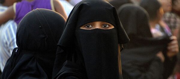 Une femme voilée - Sputnik Afrique