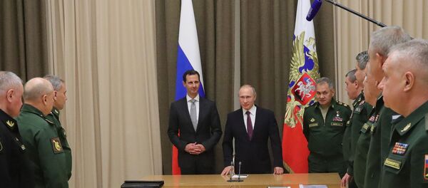 Une rencontre de Vladimir Poutine et Bachar el-Assad (archive photo) - Sputnik Afrique