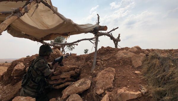 Une ligne fortifiée à Minbej en Syrie, le 19 octobre 2019 - Sputnik Afrique