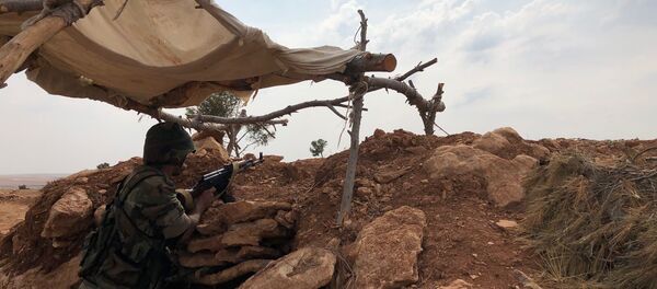 Une ligne fortifiée à Minbej en Syrie, le 19 octobre 2019 - Sputnik Afrique