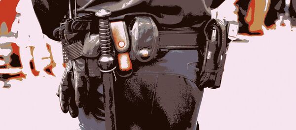 Un policier armé d'une matraque - Sputnik Afrique