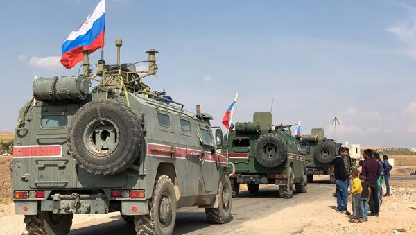 Des blindés de la police militaire russe non loin de Kobané, à la frontière syro-turque - Sputnik Afrique