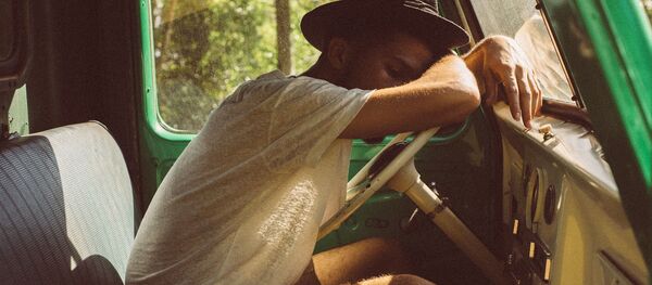 un ado au volant, image d'illustration - Sputnik Afrique